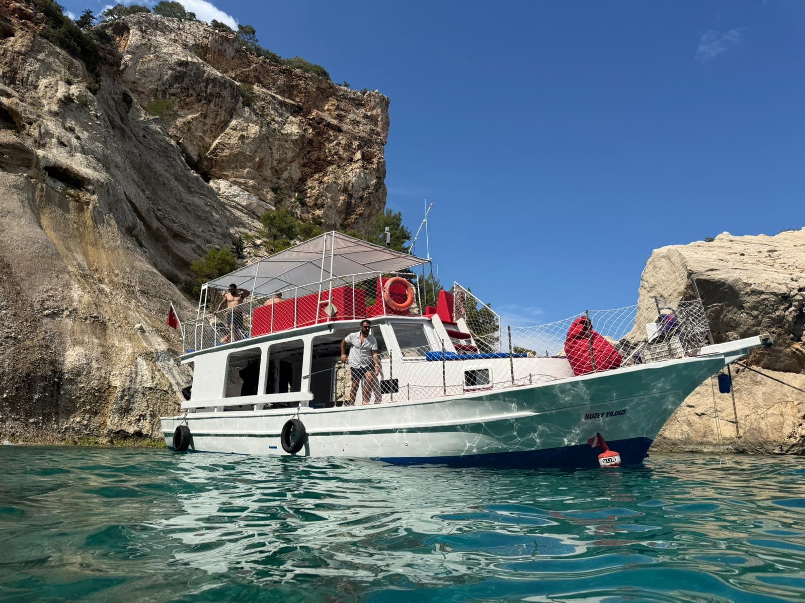 Oasis Dive Center underwater gallery photo showing divers and Mediterranean marine life